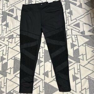NWT Xersion Performance Mid-rise Leggings with Decorative Stared Mesh cuts outs